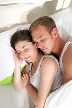 Portrait of couple sleeping in the bed Foto stock