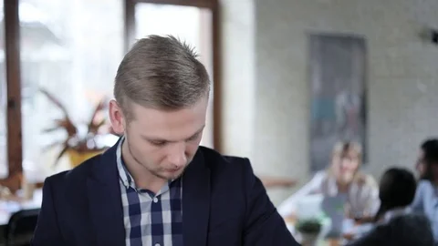 Portrait of creative successful start-upper who works in the office Stock Footage 73136814