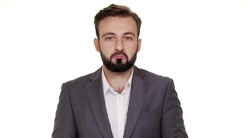 Portrait of cunning man in suit gesturing with both hands meaning oops sorry Stock Footage 82972214