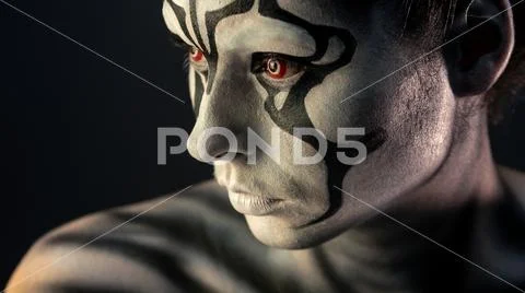 Portrait of curly girl with art makeup Stock Photos
