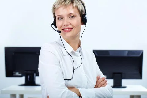 Portrait of customer support representative looking at camera with smile Stock Photos