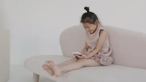 Portrait of a cute attractive charming sweet calm peaceful focused Asian girl Stock Footage 197683773