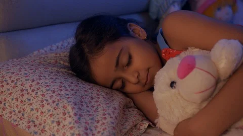 Portrait of a cute little child girl sle... | Stock Video - Pond5