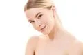 The portrait of the cute woman on the white background Photo