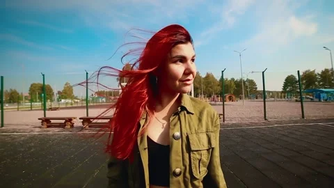 Portrait of a dancer girl walking forward on the playground. Stock Footage 148472453
