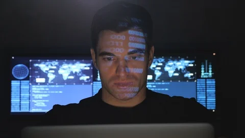 Portrait of developer programmer working on computer in a data center filled Stock Footage 102929006