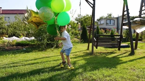 Portrait of a disabled boy with Down syndrome, smiling at the camera Stock Footage 165042649