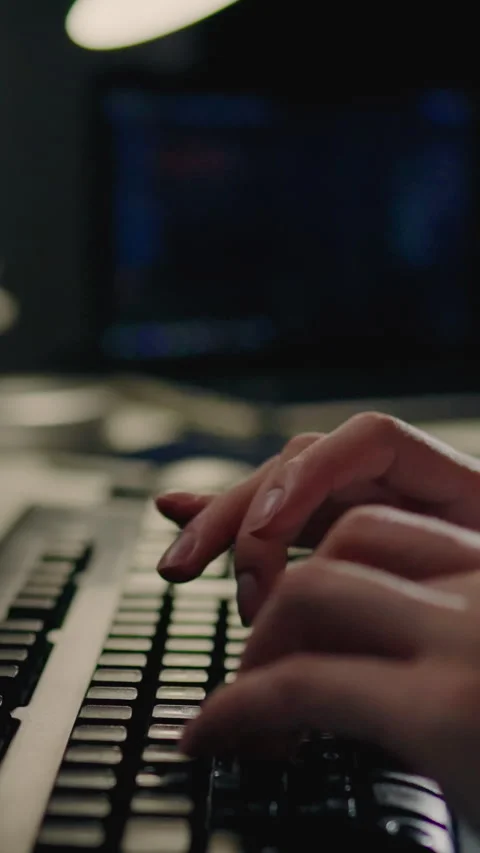 Portrait Display. Coding and creating programs, Girl sits at table and works Stock Footage 331717069