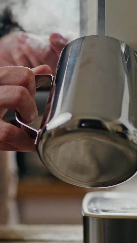 Portrait Display. Coffee drink, master coffee art uses steam device for frot Stock Footage 331717278