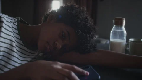 Portrait of Distraught Young Boy Suffering from Cyberbullying Stock Footage 307768984