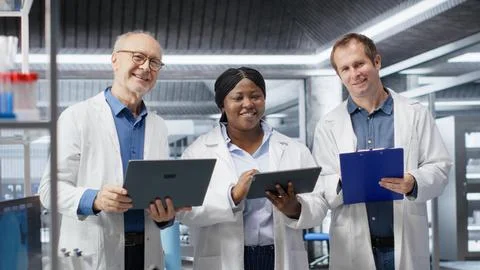 Portrait of diverse group of experts in the science lab conduct a research study Stock Photos