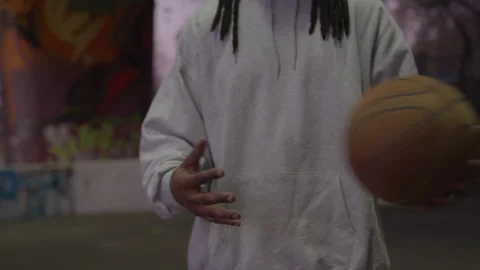 Portrait of Diverse Man with Dreadlocks and Beard Playing with Basketball at Stock Footage 270400502