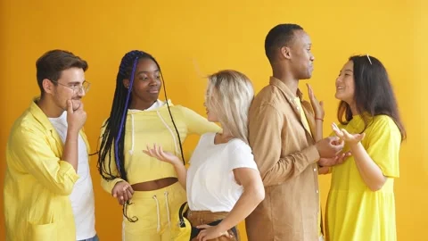 Portrait of diverse seriously looking students isolated on yellow background. Stock Footage 144424729