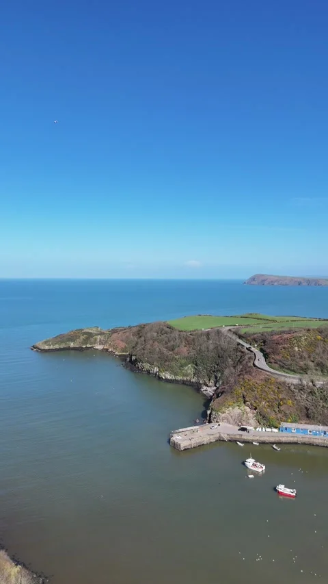 Portrait Drone of Lower Town Fishguard Coastline, Scenic Wales UK Stock-Footage 332075305
