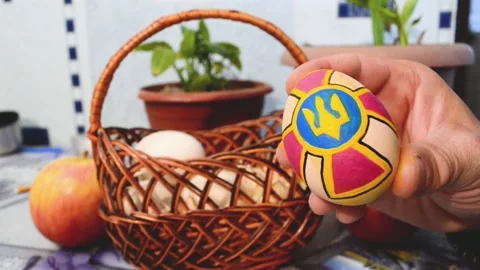 Portrait of  Easter egg painted into emblem of Ukraine,preparation to Eas Stock Footage 178039846