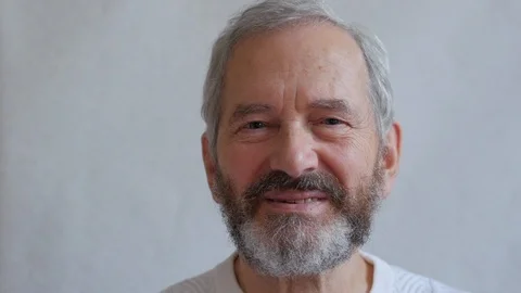 Portrait Of  Elderly Bearded Man Looking At Camera Stock Footage 92758330