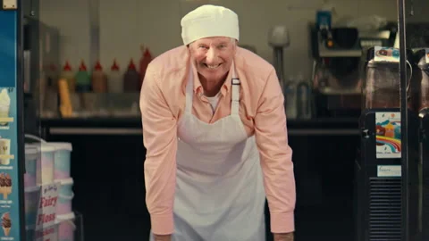 Portrait of an elderly ice cream man Stock Footage 264041904