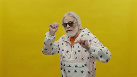 Portrait Of An Elderly Man With Beard. Gray Man On Yellow Background. He Is Stock Footage 168332109