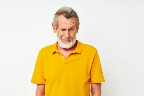 Portrait elderly man with a gray beard emotion gestures hands isolated Stock Photos