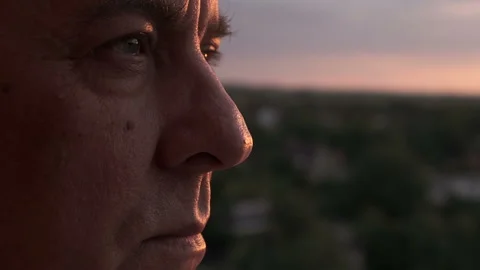 Portrait of an elderly man thoughtfully looking into the distance Stock Footage 112266936