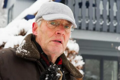 Portrait elderly man in winter Stock Photos