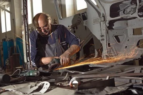 Portrait of an elderly mechanic Stock Photos