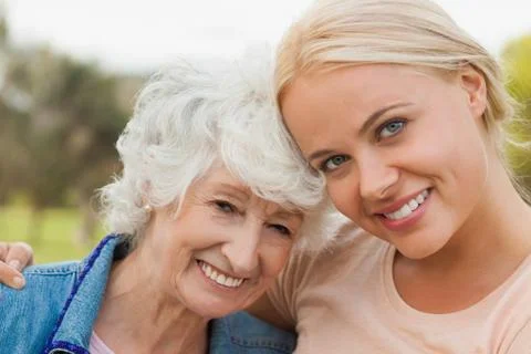 Portrait of elderly mother with adult daughter Stock Photos