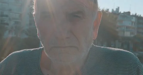 Portrait of elderly old man. senior serious face, looking to camera, close up Stock Footage 141338952