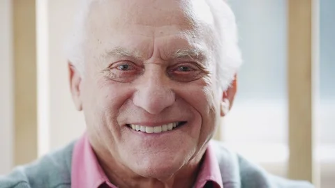 Portrait of elderly senior man smiling to camera Stock Footage 103872039