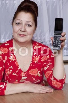 Portrait of an elderly woman at home Stock Photos