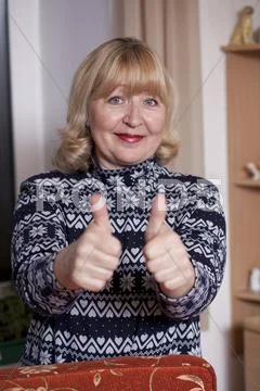 Portrait of an elderly woman at home Stock Photos
