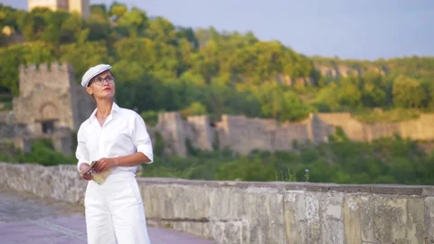Portrait of the elegant lady with the map Stock Footage 135782306