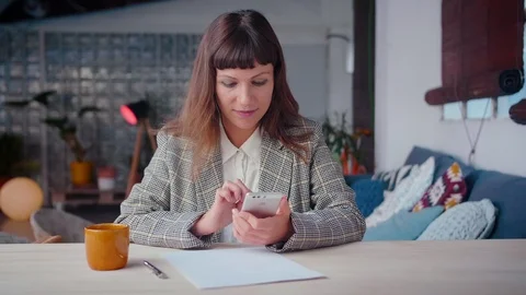 Portrait of elegant smiling business female working on mobile phone device Stock Footage 105750421