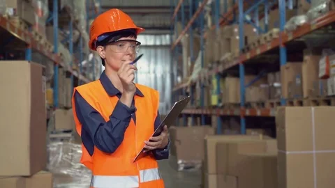 Portrait employee at work in storehouse. Stock Footage