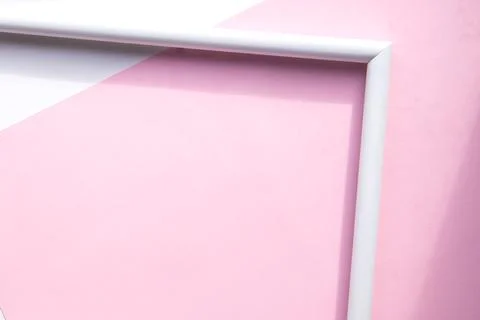 Portrait empty frame mockup on pink background Stock Photos