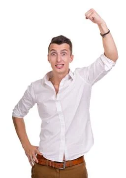 Portrait of a energetic young business man enjoying success, isolated against Stock Photos