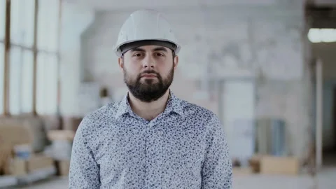 Portrait engineer builder, great design for any purposes. Work safety. Building Stock Footage 130775220