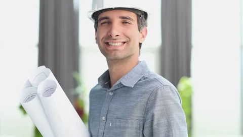 Portrait of an engineer in a hard hat posing for the camera Stock Footage 244972229