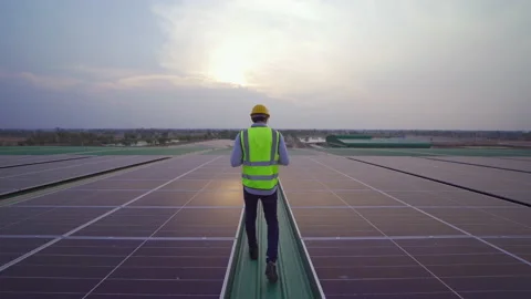 Portrait of engineer man or worker, people, working on solar panels or solar  Stock Footage 151285062
