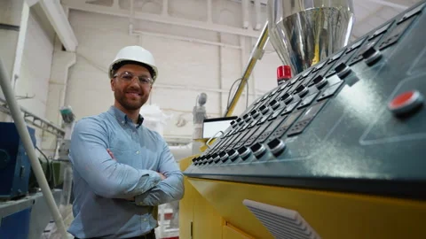 Portrait of engineer near CNC machine in factory industries Stock Footage 270104464