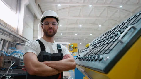 Portrait of engineer operator near CNC machine in factory industries 스톡 동영상 270106083