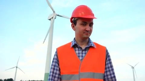 Portrait of Engineer Saying No by Head Shake. Wind farm and worker man Stock Footage 137428286