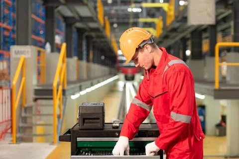 Portrait of engineer using repair tools of the electric train industry The... Foto stock
