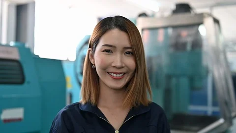 Portrait of engineering worker is smiling in heavy industry Stock Footage 126146245