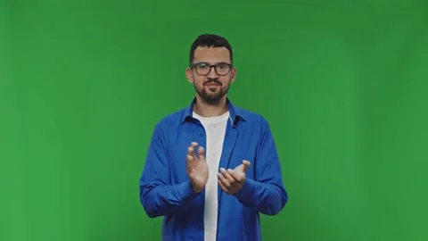 Portrait of enthusiastic young man clapping hands showing appreciation looking Stock Footage 172094269