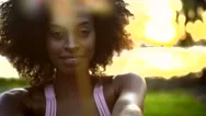 Portrait Of Ethnic Female Smiling For Social Media Video Diary Sunset Flare Stock Footage