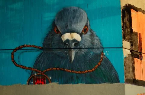 Portrait of an evil dove as graffito. Stock Photos