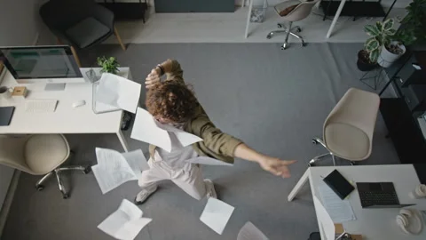 Portrait of Excited Man Throwing Paper Documents While Dancing in Office Stock Footage 345234272