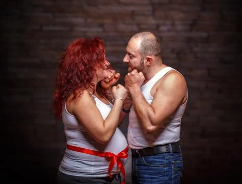 Portrait of expecting couple Stock Photos