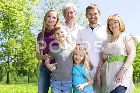 Portrait of extended family in park Stock Photos